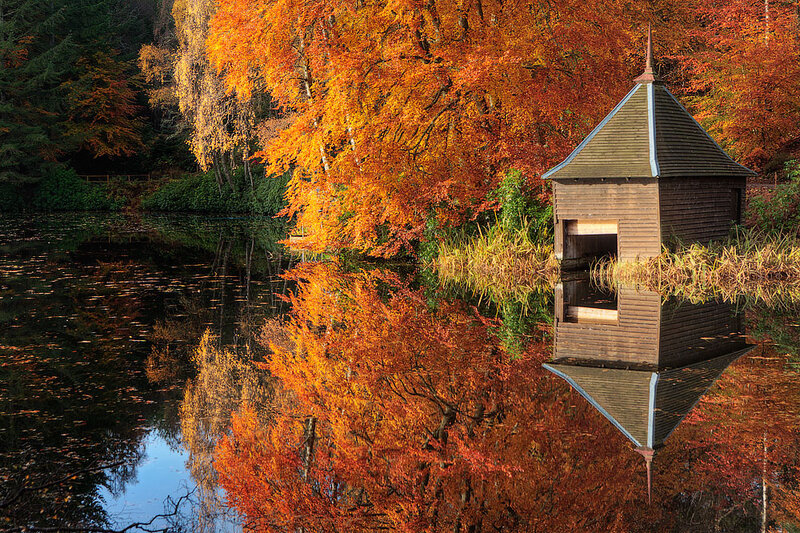 Wooden Boathouse on Lake — Orange