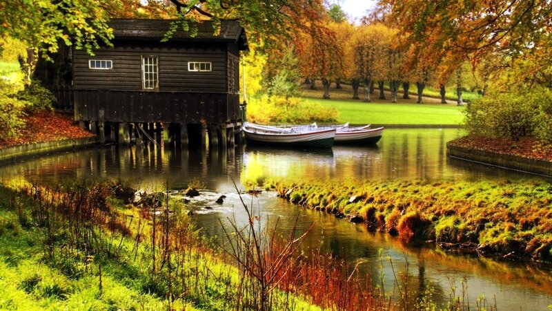 Wooden Boathouse on River — Green, Serene