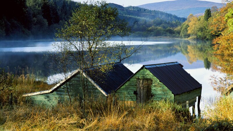 Wooden Boathouses by Lake