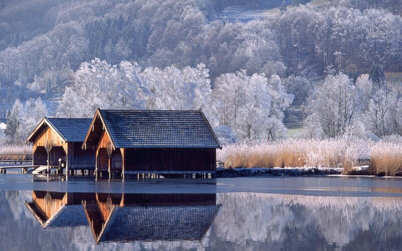 Wooden Boathouses on Lake — Blue