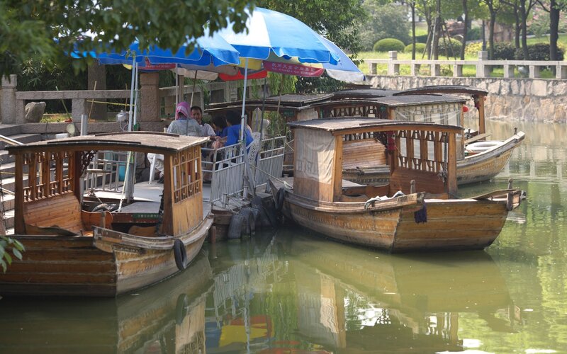 Wooden boats at a park dock