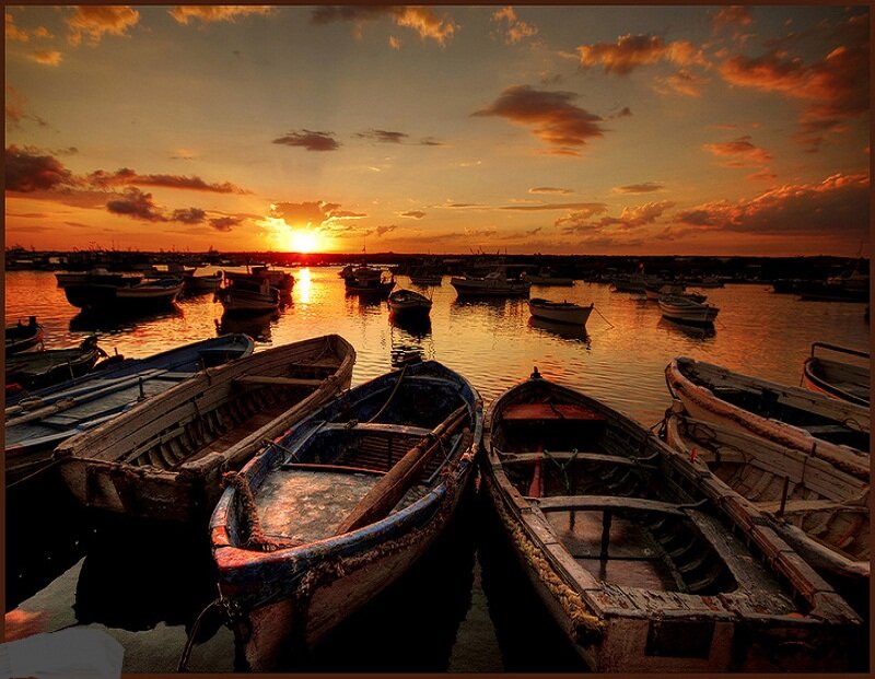 Wooden Boats at Sunset