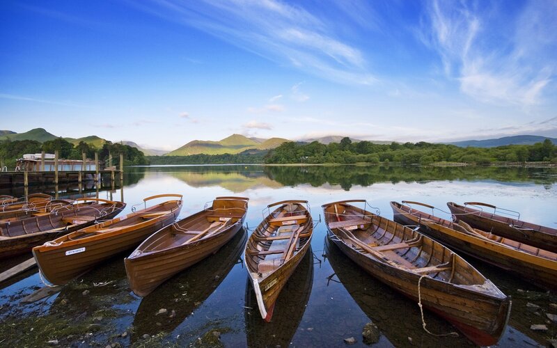 Wooden boats on a calm lake
