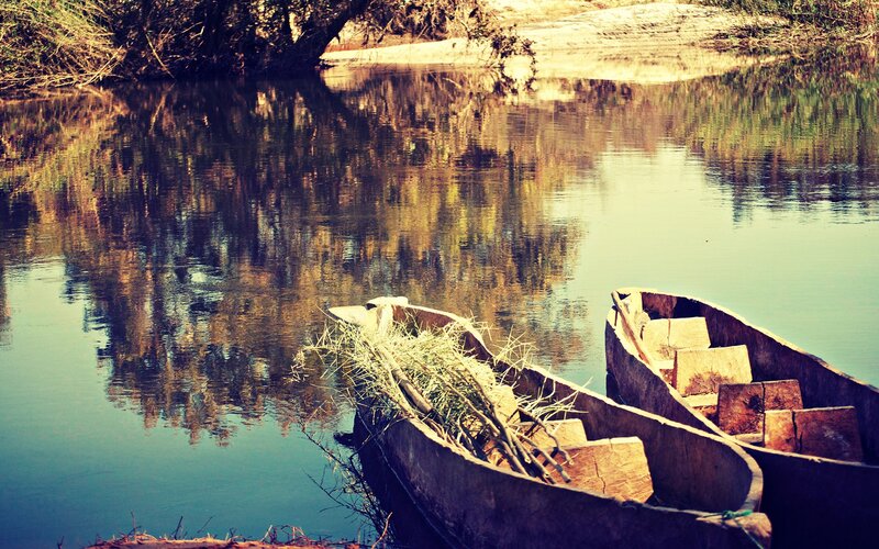 Wooden boats on a calm river