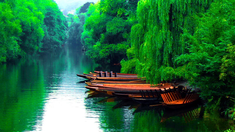Wooden Boats on River