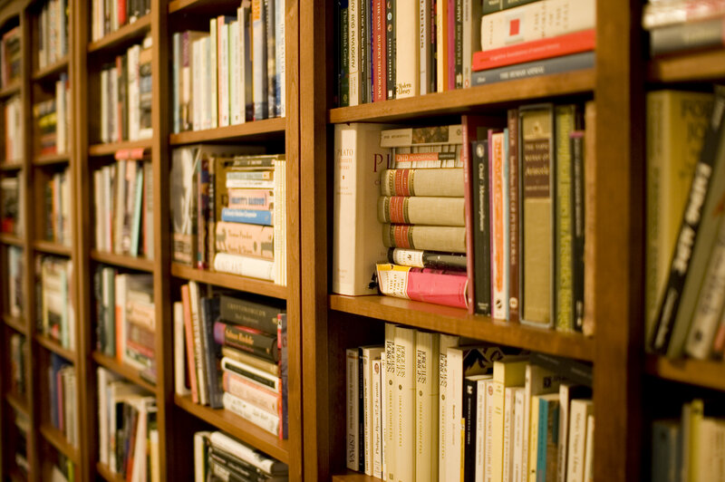 wooden bookshelves filled with books