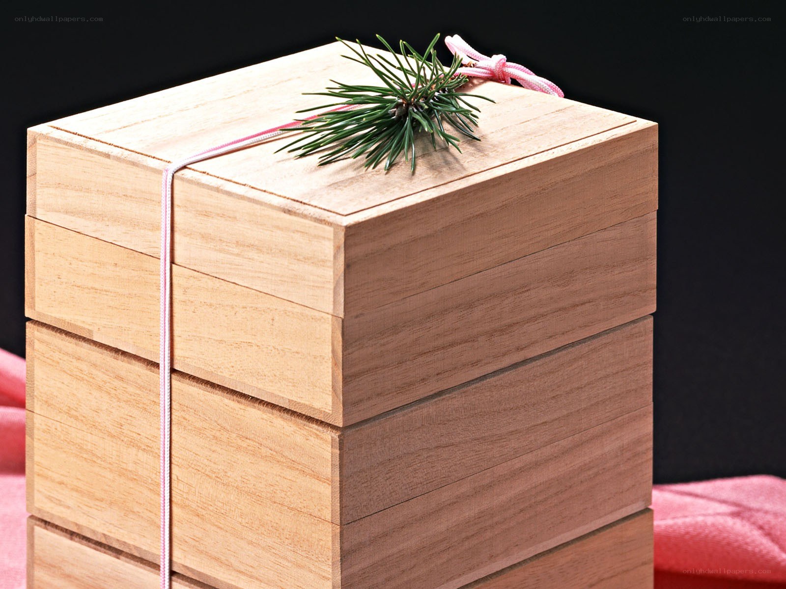 wooden box with pine sprig