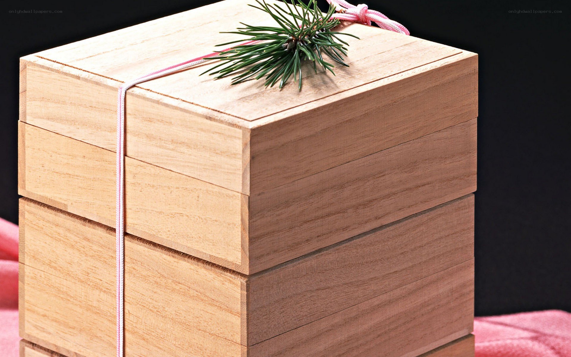 wooden box with pine sprig
