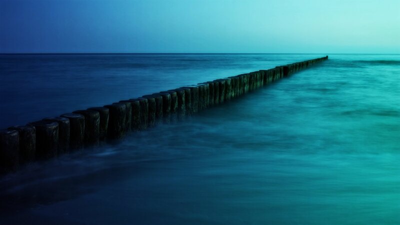 Wooden Breakwater at Sea