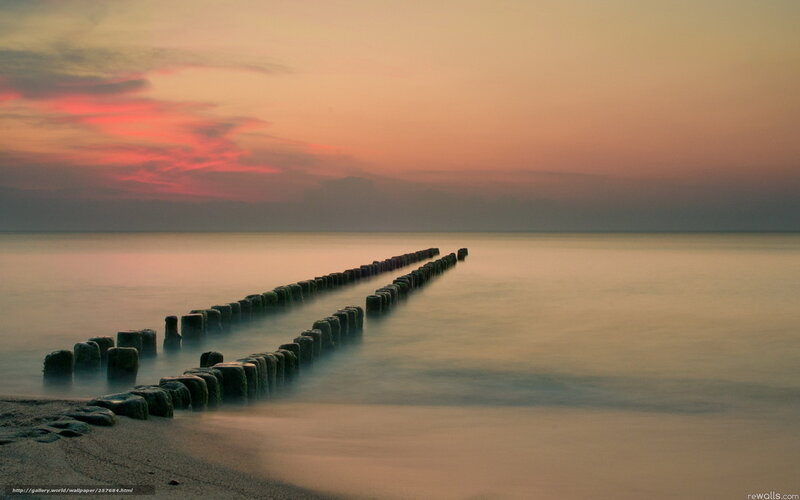 Wooden Breakwaters at Sunset