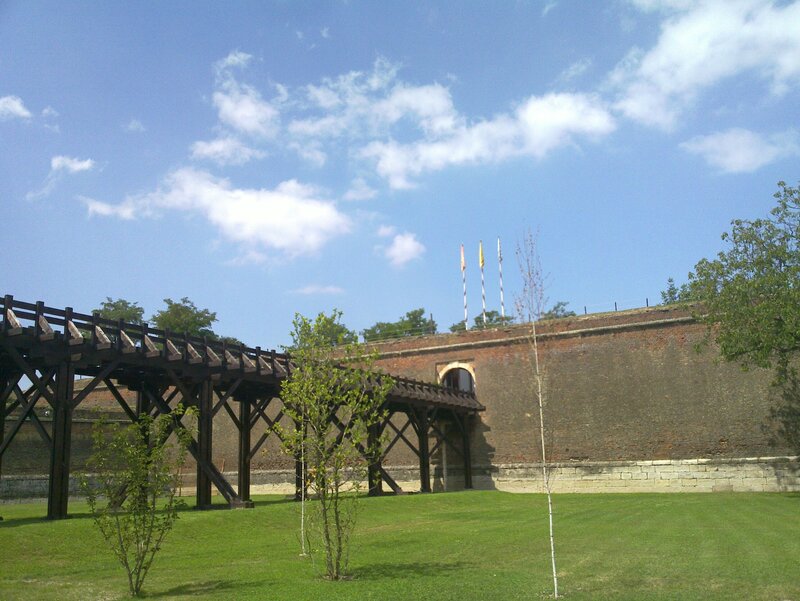 Wooden Bridge and Brick Wall