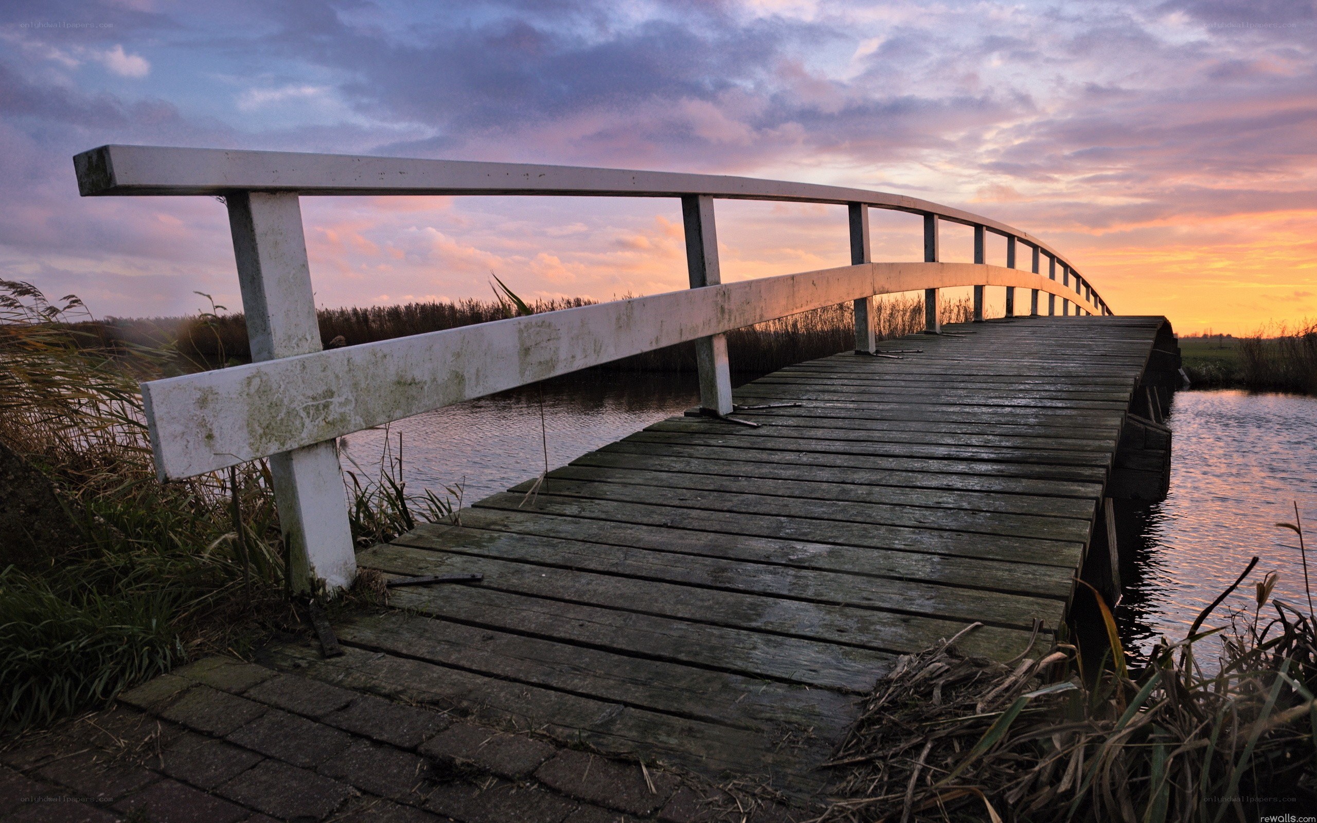Wooden bridge at sunset