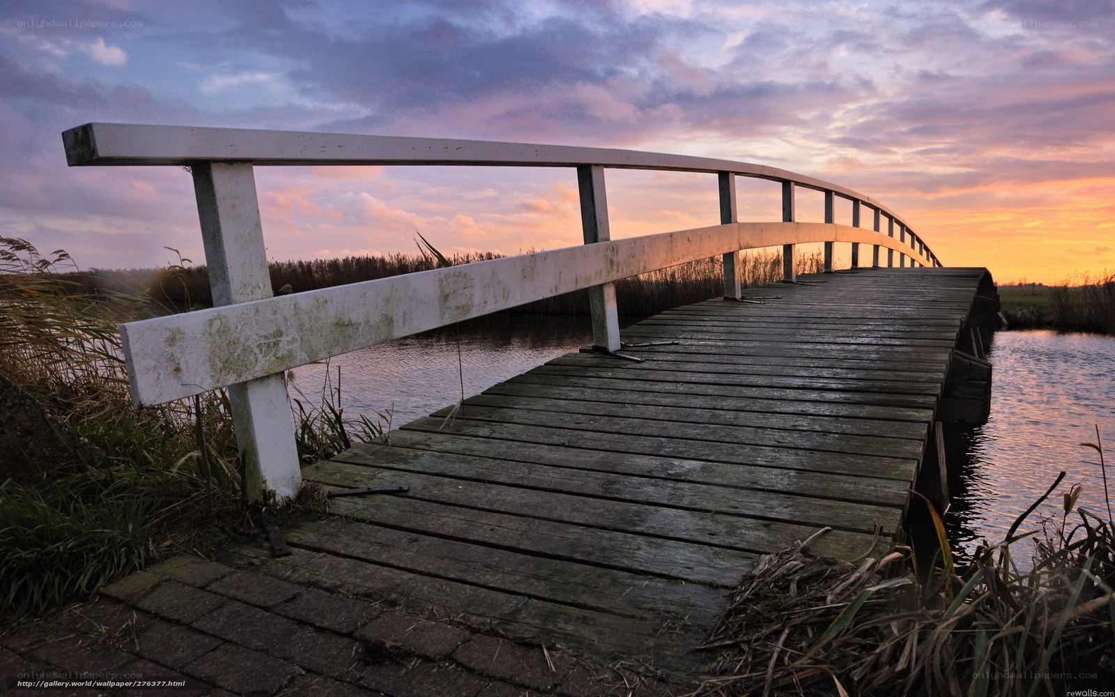Wooden bridge at sunset
