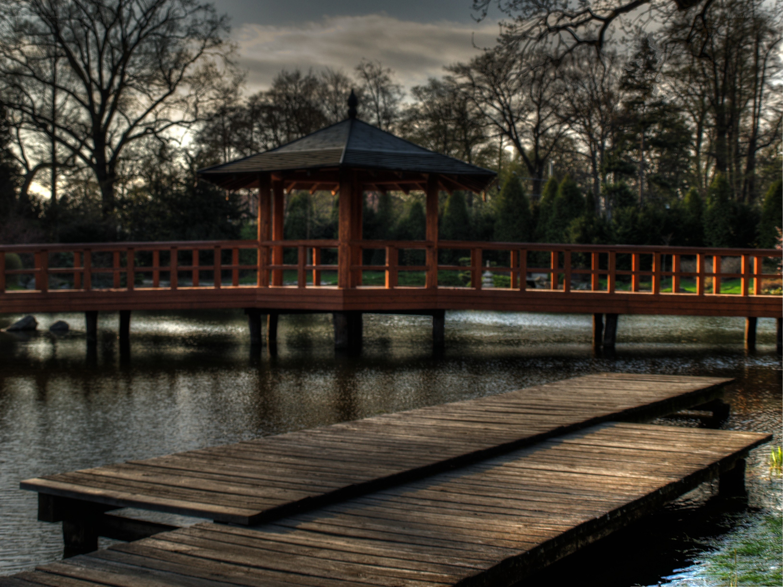 Wooden bridge over pond