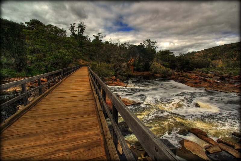 Wooden Bridge over River — Brown