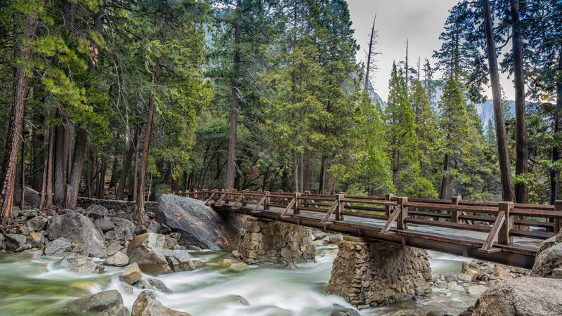 Wooden Bridge over River — Green, Serene, Afternoon, Photograph, Forest, Rocks