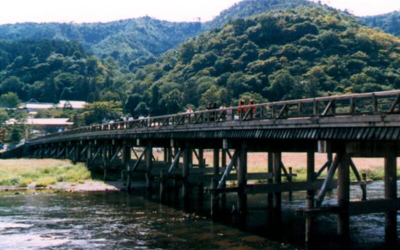 Wooden Bridge over River — Green, Serene, Afternoon, Photograph, Hills
