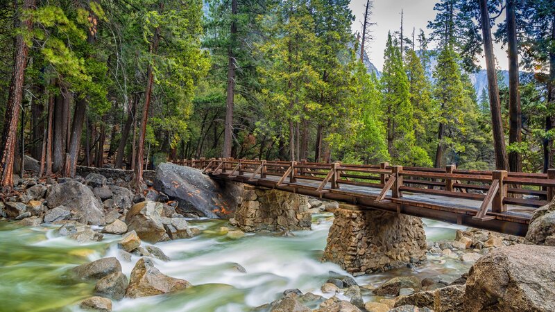 Wooden Bridge over River — Green, Serene, Afternoon, Photograph, Trees, Rocks