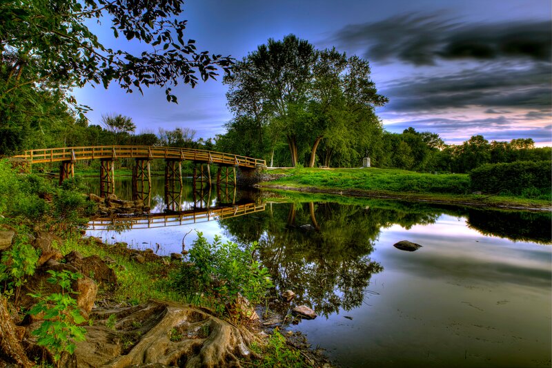 Wooden Bridge over River — Green, Serene, Sunset