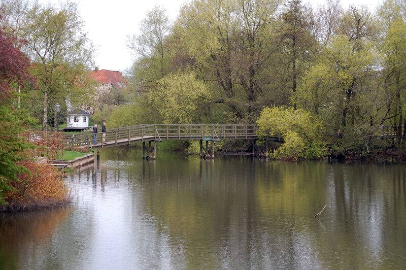 Wooden Bridge over River — Green, Serene