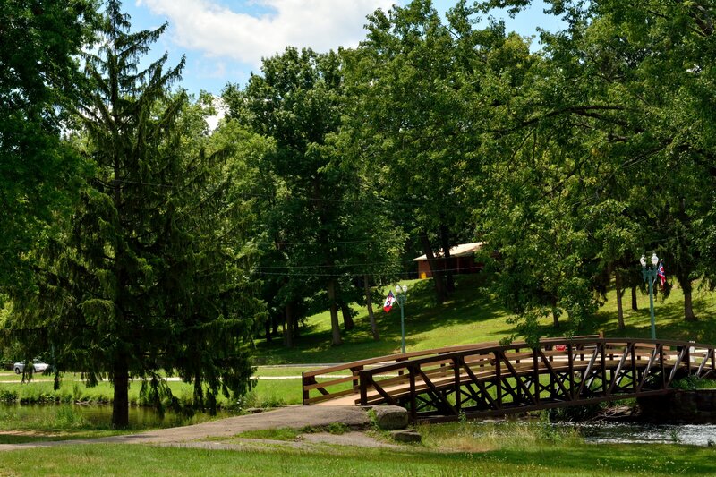 Wooden Bridge over Stream — Green, Serene, Afternoon, Photograph, Trees, Grass
