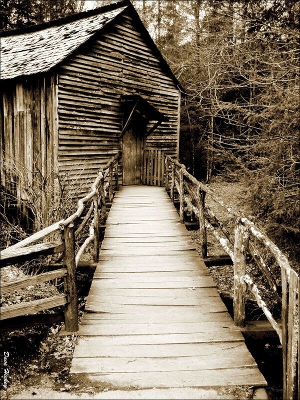 Wooden bridge to covered cabin