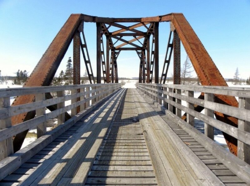 Wooden Bridge with Metal Trusses