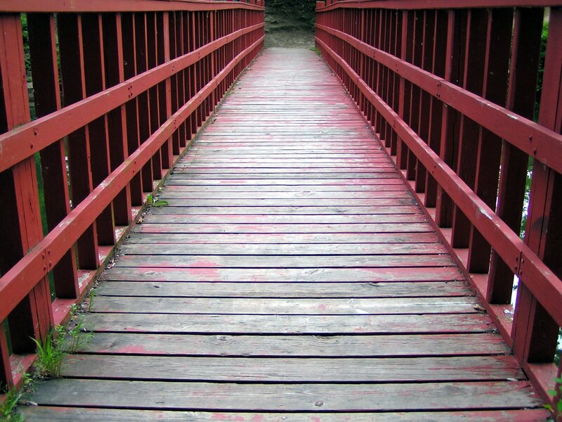 Wooden Bridge with Red Railings