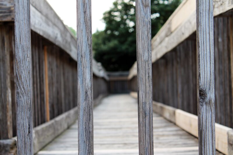 wooden bridge with vertical posts