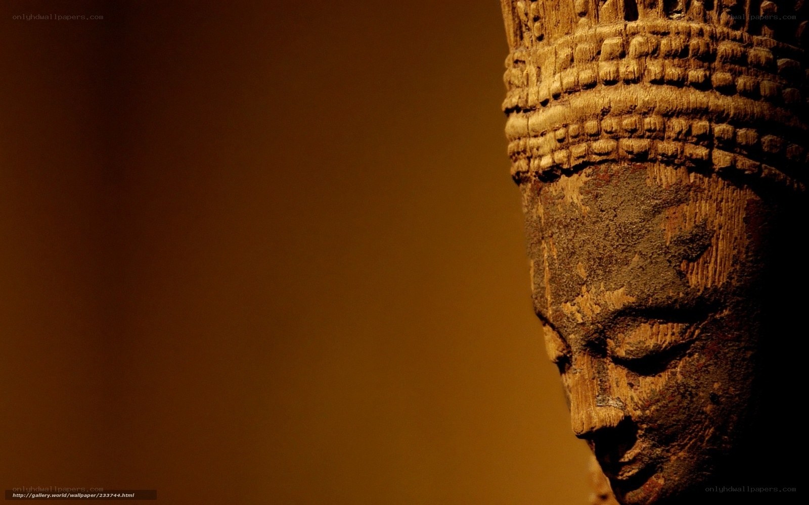 wooden buddha head sculpture