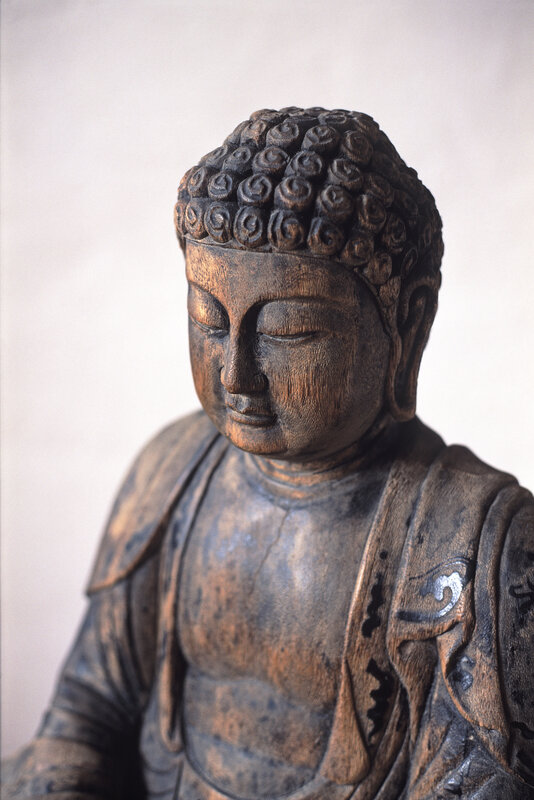 wooden buddha statue