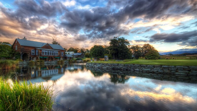Wooden Building by Pond