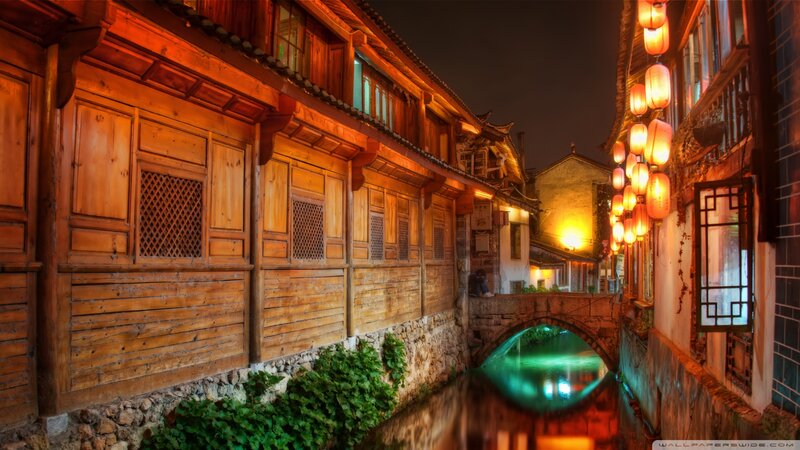 Wooden Buildings Along Canal