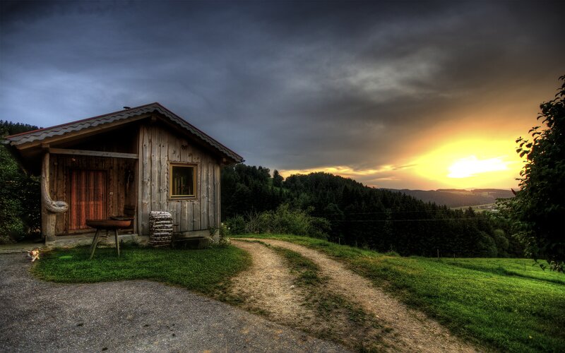 Wooden Cabin at Sunset