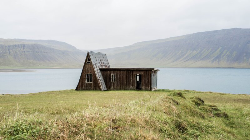 Wooden Cabin by Lake — Green, Serene, Photograph