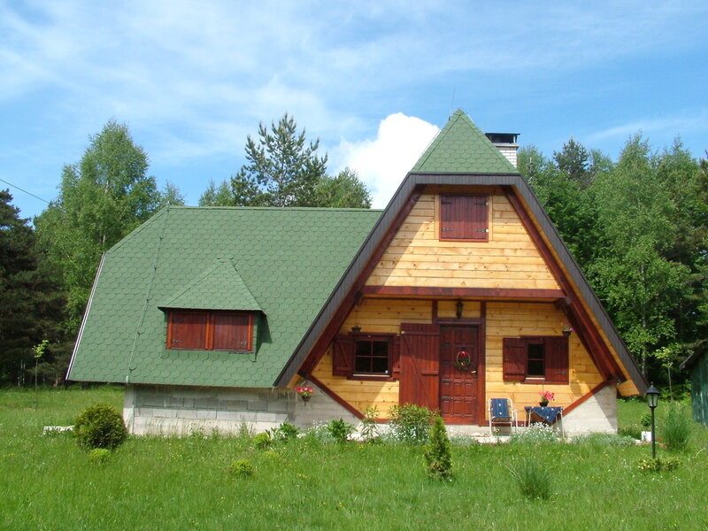 Wooden Cabin in Field — Green