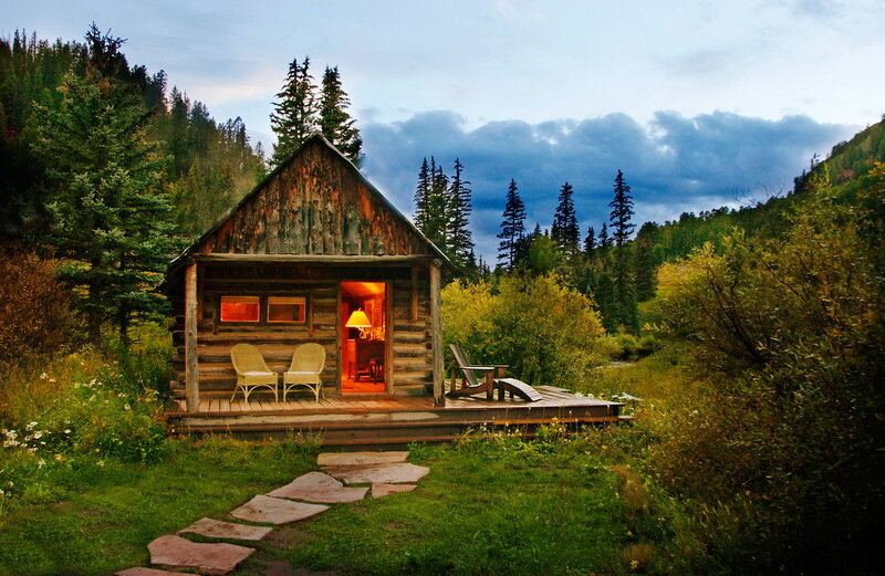 Wooden Cabin in Forest — Green, Serene, Sunset