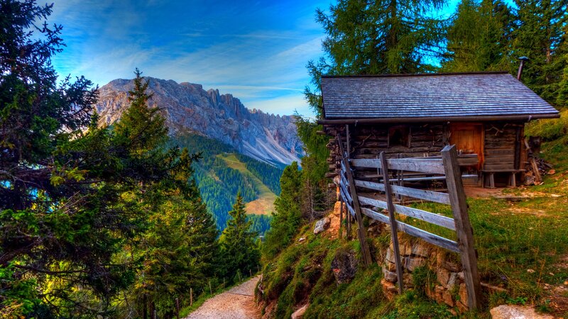 Wooden Cabin in Mountains — Green, Serene, Afternoon, Photograph, Mountain, Forest, Path