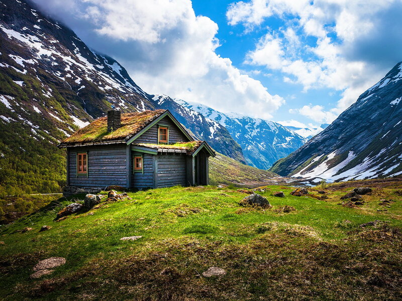 Wooden Cabin in Mountains — Green, Serene, Spring
