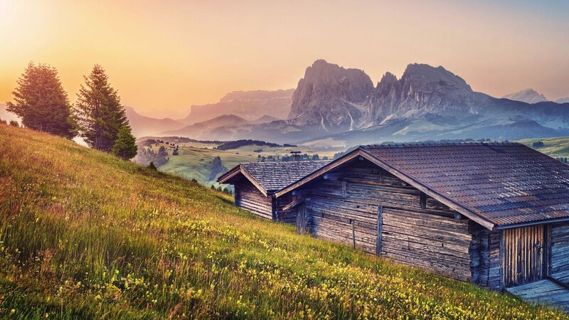 Wooden Cabin in Mountains — Green, Serene, Sunset, Photograph
