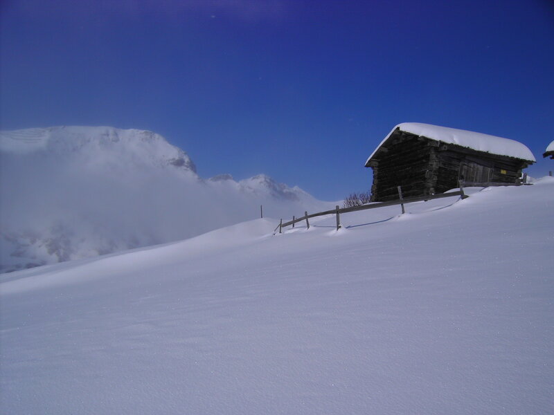 Wooden Cabin in Snow — Blue, Serene, Winter, Photograph, Mountain, Fence, Clouds