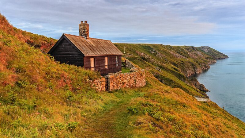 Wooden Cabin on Cliff