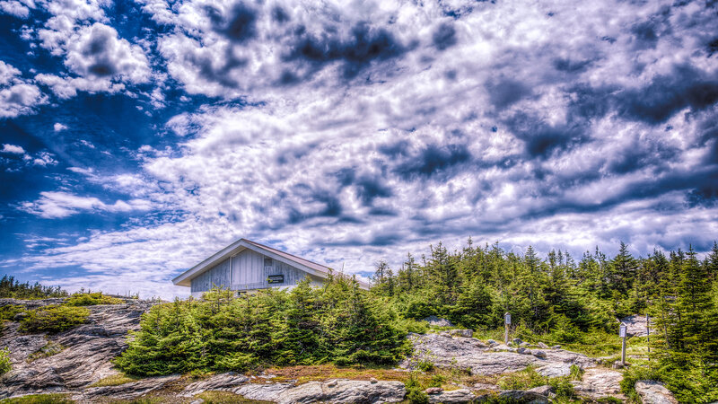 Wooden Cabin on Hillside — Blue