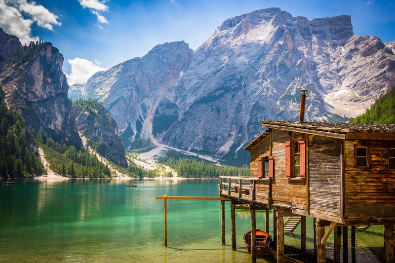 Wooden Cabin on Lake — Blue, Serene, Afternoon, Photograph, Mountains, Boat