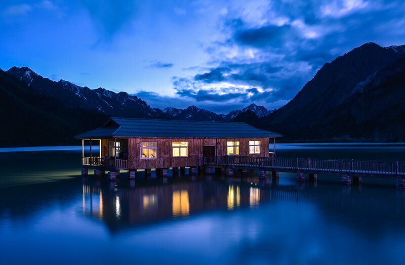 Wooden Cabin on Lake — Blue, Serene, Night