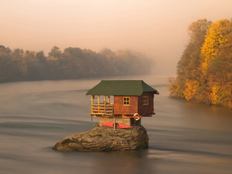 Wooden Cabin on Rock