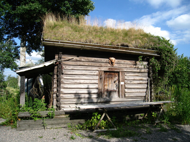 Wooden Cabin with Grass Roof — Brown