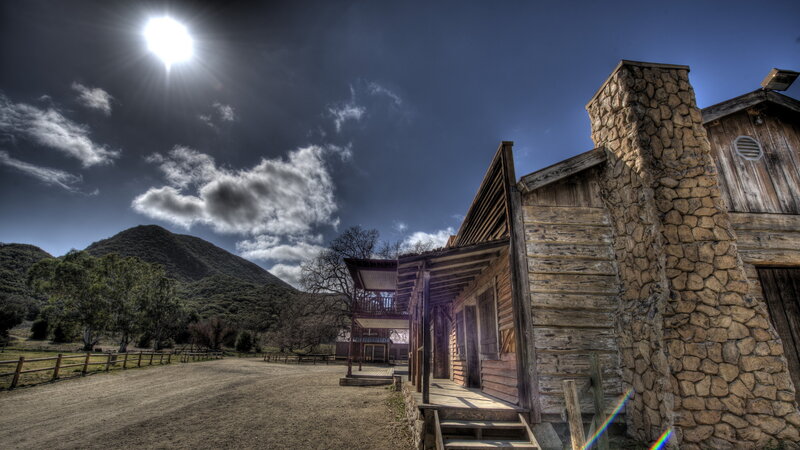 Wooden Cabin with Stone Chimney