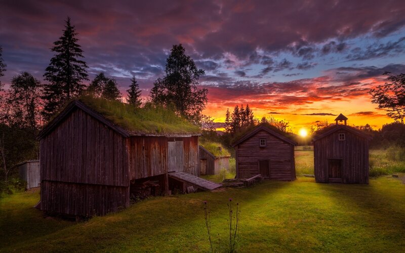Wooden Cabins at Sunset
