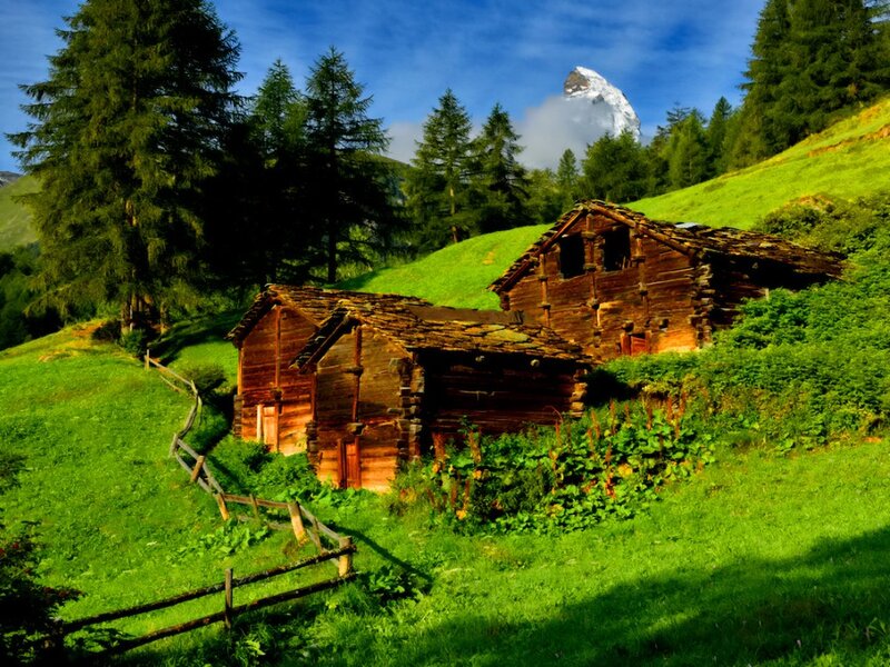 Wooden Cabins in Alpine Valley